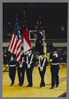 Photograph of Air Force ROTC cadets presenting the colors at an East Carolina basketball game